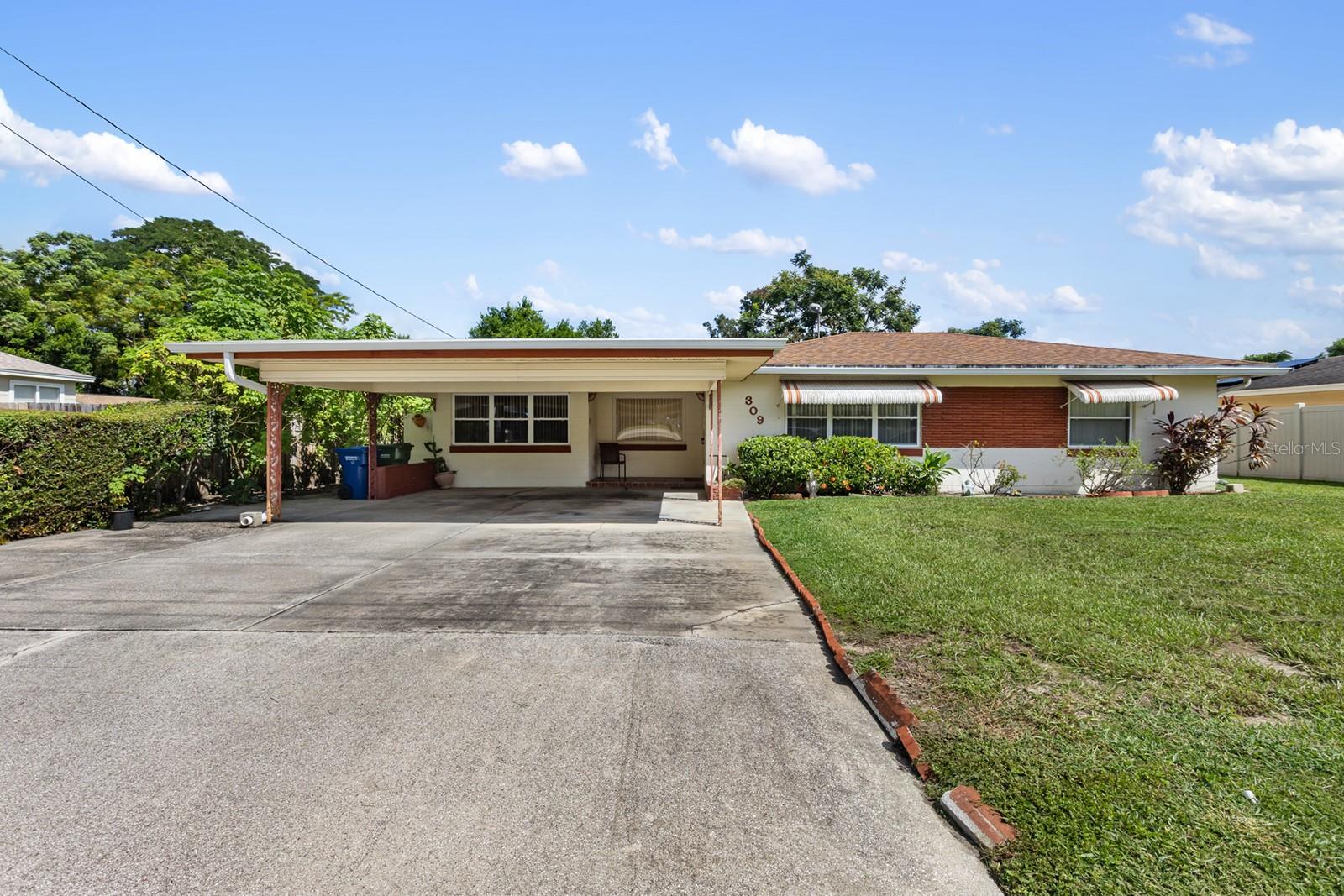 SELLER IS MOTIVATED! Submit highest and best by 11:59pm on Sunday, September 14, 2025. Discover the charm and potential of this vintage 4-bedroom, 2.5-bathroom home in the heart of Winter Haven. Bursting with character, this fully furnished residence offers strong bones, timeless details, and a rare opportunity for anyone seeking a CASH-ONLY, AS-IS property. No-HOA, No-CDD & LOW TAXES! The home features a split floor plan with a spacious primary suite with a full bath, plus a secondary suite with a half bath for added convenience. A large formal dining room and generously sized living room make it easy to imagine hosting gatherings, while the carport with extra parking provides room for multiple vehicles.
The property sits on a beautifully landscaped lot, complete with a shed, a brick privacy fence, and vibrant plantings including Mexican sunflowers, lavender, and palmera. With the roof, A/C, and hot water heater all approximately 10 years old, the home is ready for a creative buyer to update, restore, and unlock its full potential.
Perfectly situated, the home is just minutes from downtown Winter Haven, Winter Haven Hospital (5 minutes), and Legoland (13 minutes). Schools such as Denison Middle and Grace Lutheran are within short distance, with Polk State College, local walking trails, and the city bus stop nearby. Daily errands are easy with Publix and local shopping close at hand, while the nearby lakes and parks offer endless opportunities for recreation.
Whether you’re drawn to its vintage charm, investment potential, or convenient location, this property is full of promise. Don’t miss your chance.