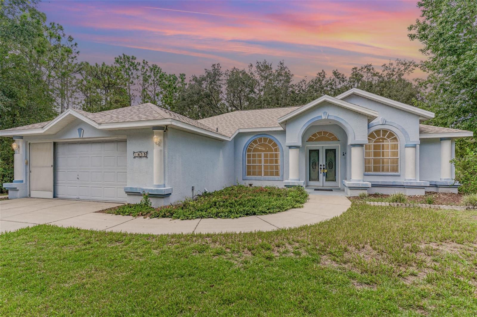 What’s Special About This Property? Discover this Citrus Hills gem, perfectly situated on nearly an acre with NO HOA and NO CDD fees! This beautifully maintained 3-bedroom, 2-bath, 2-car garage home features a NEW roof and gorgeous hardwood floors. The owner suite offers a large walk-in closet plus an additional closet, a private bath with a deep soaking tub, and a separate walk-in shower. From the owner suite step out to a spacious enclosed Florida Room—perfect for relaxing year-round.The large screened-in lanai overlooks a peaceful, wooded backdrop, offering privacy, room to roam, and an ideal setting for unwinding. The kitchen boasts a double sink, eat-in breakfast nook, smooth-surface stove, fridge with ice/water maker, a large pantry closet, and a skylight for added natural light. Guest bath with walk-in shower. Split floor plan with two guest bedrooms and central vac system. Washer and dryer located in the garage. This home offers flexibility for any lifestyle, peace of mind, and endless possibilities. Conveniently located just minutes from shopping, dining, and natural springs. Don’t miss out—call today to schedule your private tour of this move-in-ready home in a highly desirable location!