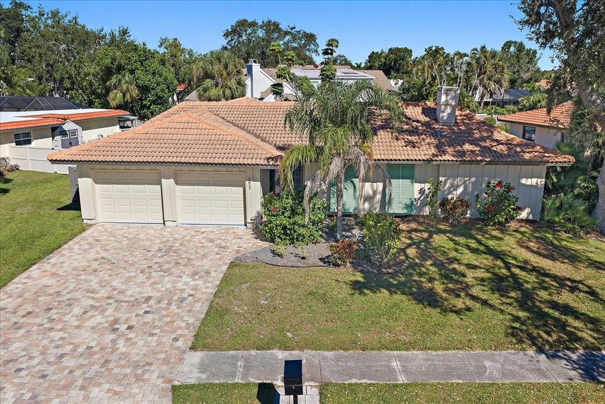Welcome to Gulf Gate Woods — a quiet, tropical enclave lined with winding streets and mature trees. This immaculate, recently updated 3-bedroom, 2-bath, 2-car garage home blends function and comfort in a split floor plan that feels open and inviting. 
The renovated kitchen features quartz countertops, stainless steel appliances, and solid wood cabinetry with abundant storage. The owner’s suite includes an ensuite bath, a walk-in closet, and sliding glass doors opening to a serene covered lanai. Enjoy details such as acoustic panels, wood trim detail, upgraded porcelain tile, and bathroom cabinets & fixtures - the work has all been done for you.  
The fenced backyard is shaded by stately pines and offers plenty of space for a future pool. The spotless garage comes with dual remote-operated doors and ample room for projects or storage.
This sought-after community sits minutes from Sarasota Memorial Hospital, Downtown Sarasota, and Gulf Gate Drive’s dining and shops. You’re less than 7 minutes from world-famous Siesta Key Beach — consistently ranked America’s #1 beach. With easy access to I-75 and US-41, you’re perfectly positioned to enjoy everything in Sarasota.
Schedule your showing today and discover the best value in Gulf Gate Woods. The work has been done for you, so pack your bags and move on in!