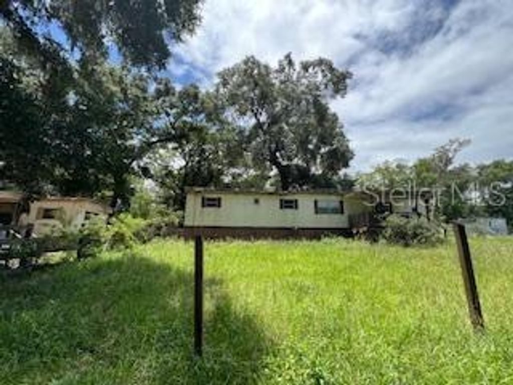 Photo of 207 Ridge Street, Pomona Park, FL 32181 (MLS # TB8404303)