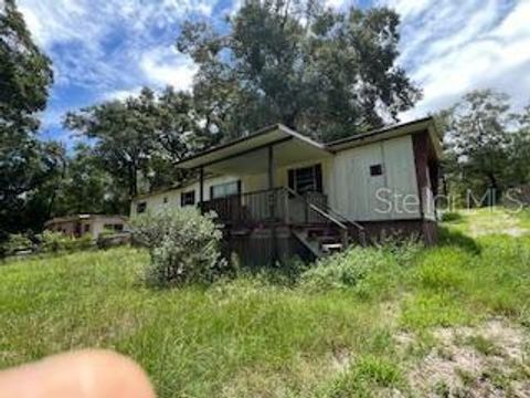 Photo of 207 Ridge Street, Pomona Park, FL 32181 (MLS # TB8404303)
