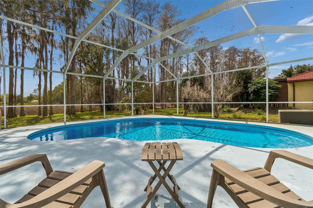 Photo of 210 Lake Hobbs Road, Lutz, FL 33548 (MLS # TB8442312)