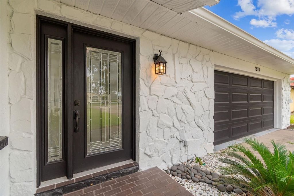 Photo of 210 Lake Hobbs Road, Lutz, FL 33548 (MLS # TB8442312)