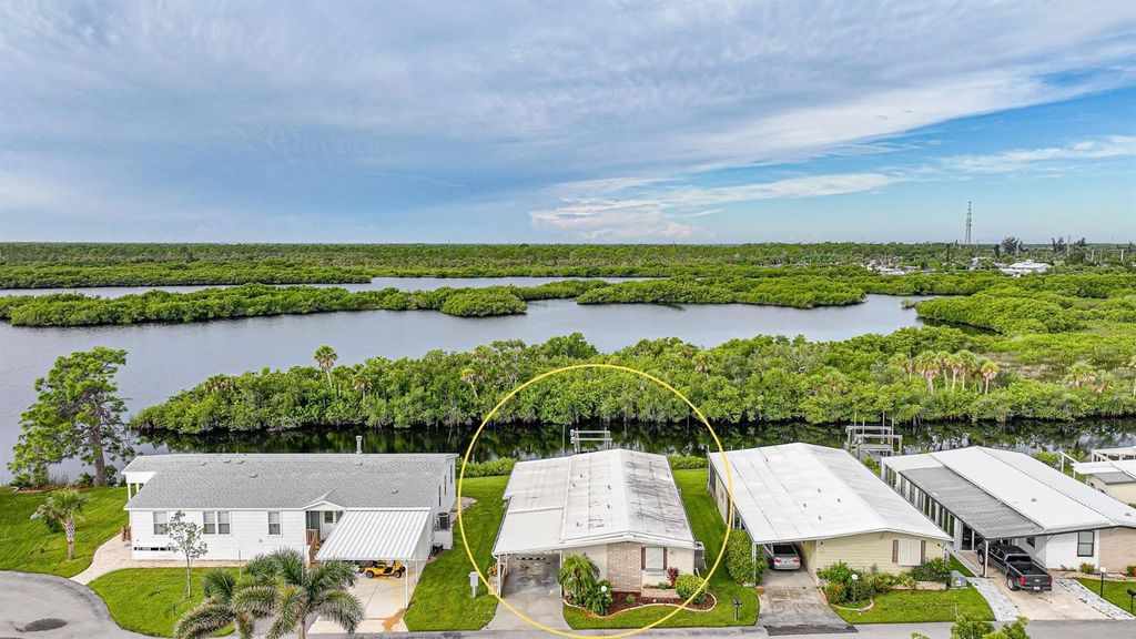 Photo of 107 Lazy River Road, North Port, FL 34287 (MLS # C7515042)