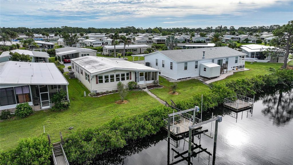 Photo of 107 Lazy River Road, North Port, FL 34287 (MLS # C7515042)