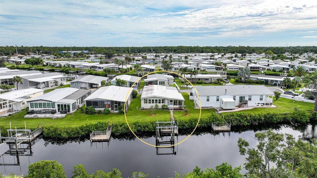 Photo of 107 Lazy River Road, North Port, FL 34287 (MLS # C7515042)