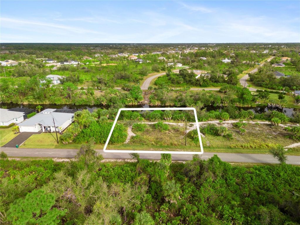 Photo of 13228 Amaryllis Circle, Port Charlotte, FL 33981 (MLS # D6133877)