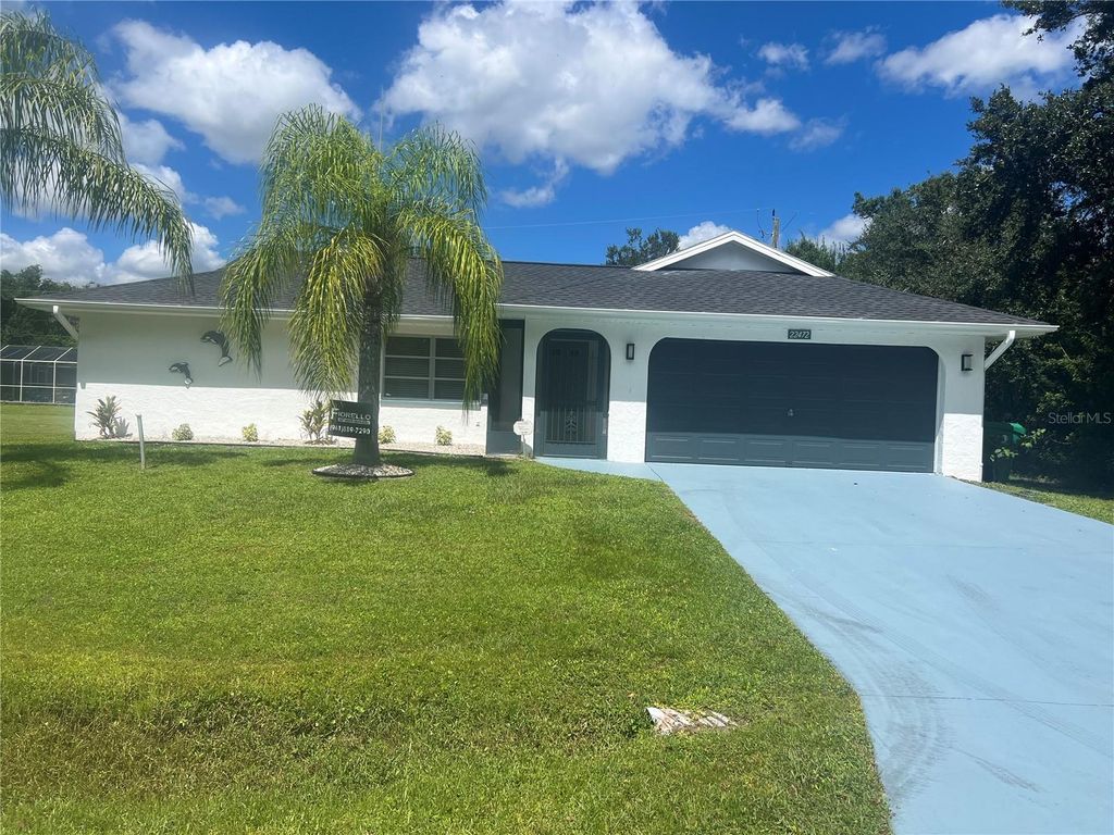 Photo of 22472 Tennyson Avenue, Port Charlotte, FL 33954 (MLS # C7515426)