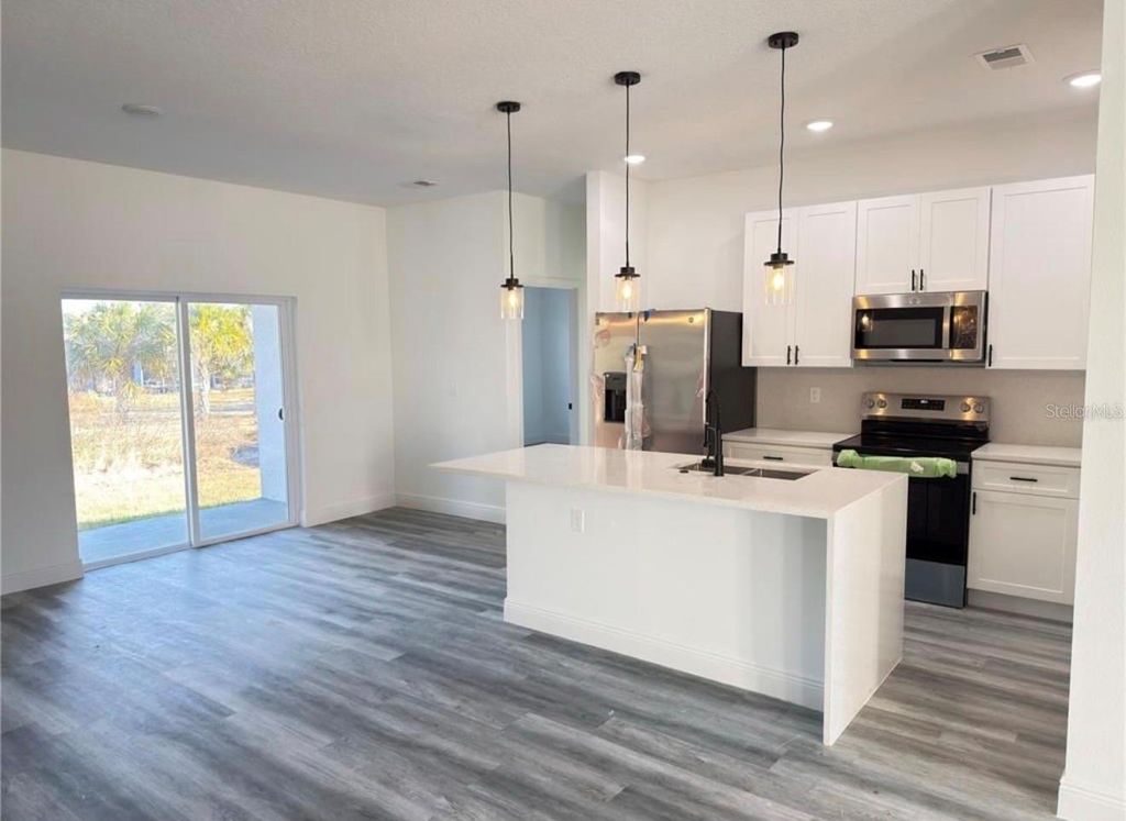 Photo of 17356 SW 41st Circle, Ocala, FL 34473 (MLS # O6379112)