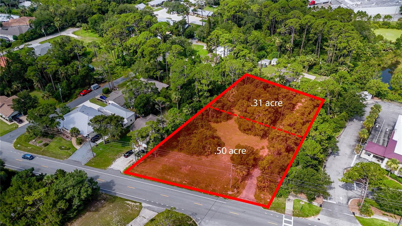 Build Your Coastal Dream in the heart of Flagler Beach! Imagine designing your perfect retreat just steps from the Intracoastal Waterway and moments from the Atlantic Ocean. High & dry, with the coveted Zone X designation! Use any builder with no time frame to build! With over three quarters of an acre(.802 acres) to build on, this oversized parcel can fit a wide array of floorplans and designs! Build a large estate home on this magnificent piece of property, or build two homes. Private location, but do not let this country setting fool you because you right in the heart of Flagler beach! This partially cleared parcel offers additional value & less expense than a traditional wooded vacant land. This ideal location is unmatched—close to unique shops, local dining, boat ramps, scenic trails, and the laid-back Flagler Beach lifestyle.