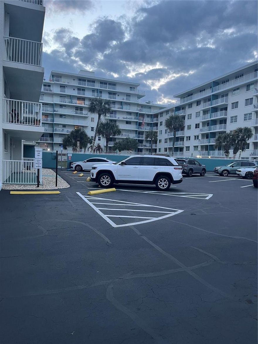 Incredible light and bright condo with ocean views (across the street) from your 4th floor private balcony. Fabulous 2 bedroom, 2 bath condo, recently furnished (and immaculate) in a nautical theme. Laminate flooring through the living and dining areas. Kitchen and baths have tile. Kitchen is all remodeled with mostly new appliances. Sliding glass door to the balcony with direct views of the pool and the ocean. Bedroom 1 features a king bed with a bath tub & shower. Bedroom 2 is spacious, features a queen and one twin size bed plus a walk-in closet. All with crown molding throughout. This building is impeccably maintained with, a new roof and low monthly fees, it features a gated entrance, on-site management and on-site laundry. Plenty of parking in front of building. Easy beach access across the street and shopping and restaurants. New a/c units and all assessments paid. This is a NO PET building. Great management, Great reserves, inspection/structural reports all good!