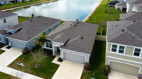 Photo of 33888 Field Maple Loop, Wesley Chapel, FL 33545 (MLS # TB8486336)