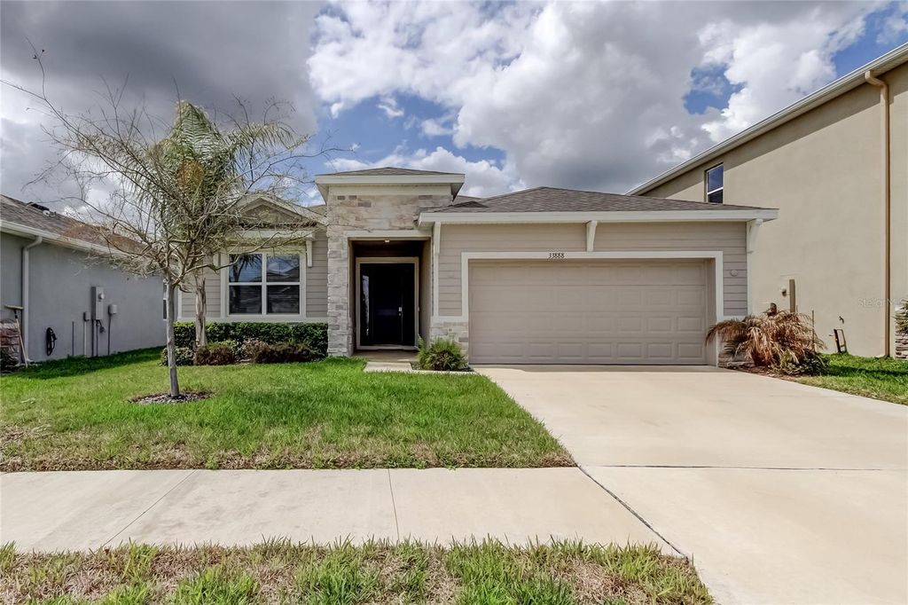 Photo of 33888 Field Maple Loop, Wesley Chapel, FL 33545 (MLS # TB8486336)