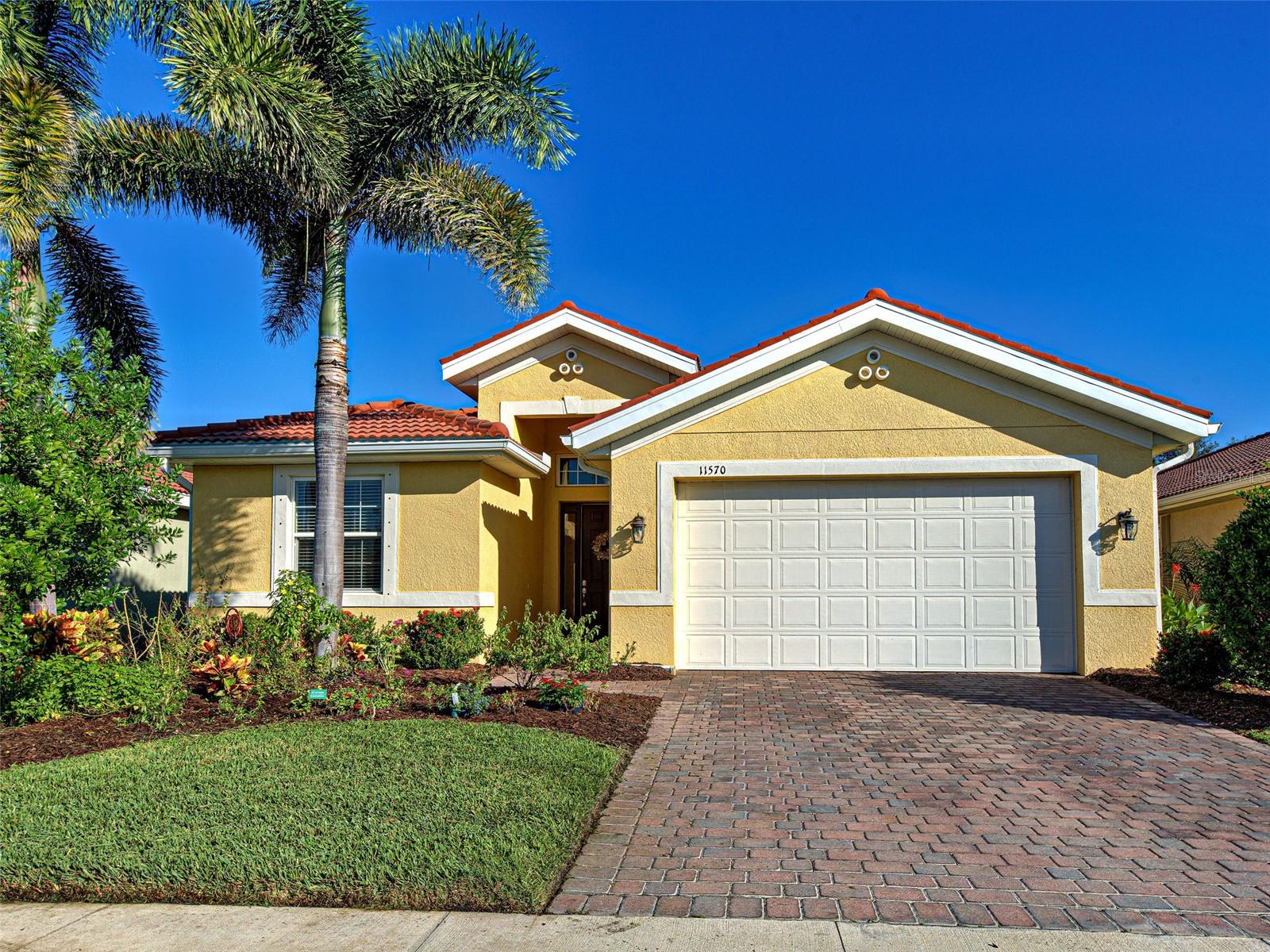 Welcome to this beautifully maintained 3-bedroom, 2-bathroom single-family home with an office located in the desirable Caribbean Village community in Venice, Florida. This pristine residence offers a perfect blend of comfort, elegance, and Florida charm. Step inside to find high ceilings, crown molding and an open floor plan, ideal for entertaining and everyday living. The kitchen is a chef's dream with granite countertops, stainless steel appliances and a beautiful backsplash.  There is seating at the island and a closet pantry.  The spacious living area flows seamlessly to the screened-in lanai with pavers, where you can relax and take in the peaceful surroundings. The backyard butterfly garden is truly enchanting—attracting colorful butterflies and hummingbirds, and even a family of sandhill cranes that call this area home. This maintenance-free community offers resort-style amenities including two gated entrances, a sparkling community pool, clubhouse, and fitness center—providing the perfect balance of relaxation and activity. Conveniently located in the wonderful town of Venice, you’ll enjoy easy access to beautiful Gulf beaches, charming downtown shops, dining, and entertainment. The current owner has an assumable 2.875% VA loan which can be assumed by anyone. You do not have to be a Veteran. Don’t miss this opportunity to own your slice of paradise in Caribbean Village—the home you’ve been searching for awaits!