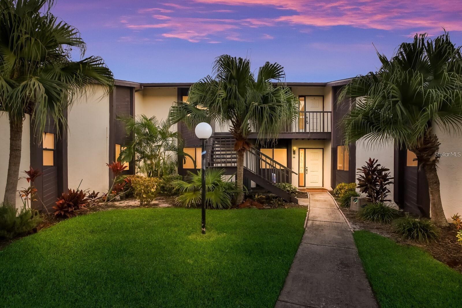 Available now for 4 to 6 months. Great location! Renovated turn-key furnished condo with beach accessories included. 2 bedroom, 2 bathroom with expansive Florida room with nice sunset views over the lake. This unit has vaulted ceilings and a spacious open floor plan that was completely updated inside including newer AC system, nice high end finishes throughout that include luxury vinyl plank flooring in every room, designer lighting, seamless shower, vanities, new interior paint. Beautiful kitchen has custom cabinetry, quartz & butcher block surfaces, farmhouse sink, wood plank open shelving, and new stainless steel appliances. One covered carport space. In this ACTIVE 55+ COMMUNITY there are two community pools, a clubhouse, shuffleboard and more. So close to shops, restaurants, IMG Academy, Downtown Bradenton and minutes away from Anna Maria Island and its beaches. Available for next season 2026 at $3,500 a month.