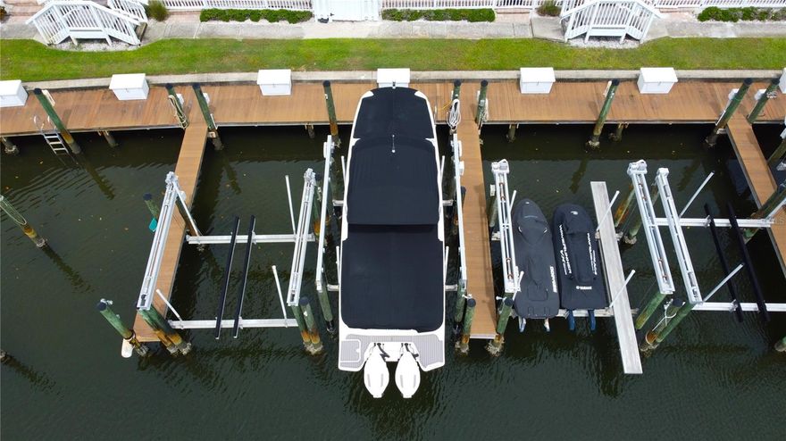 Welcome to a Boaters Paradise with direct access to Tampa Bay with no bridges. This 13,000lb lift is available to purchase in Waterside South Coquina Key. Dock has water and electric plus a fish cleaning station. Must own Condo in either South or Northside to purchase...Lucky for you the unit directly in front of it is for sale..(TB8425200).
Slip is located behind building 46 on 5023 Starfish Dr SE...31ss on box in front of lift.Go Directly to Site.