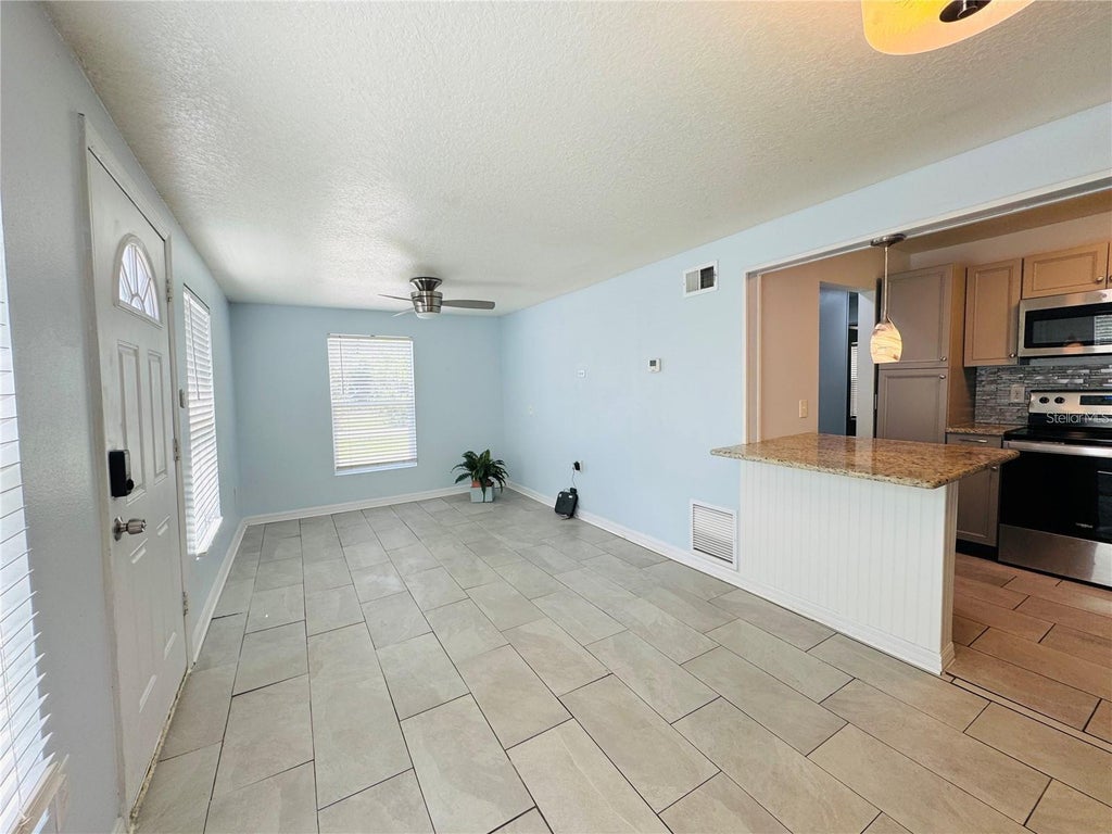 Photo of 1683 Fricke Avenue, Orlando, FL 32828 (MLS # O6433068)