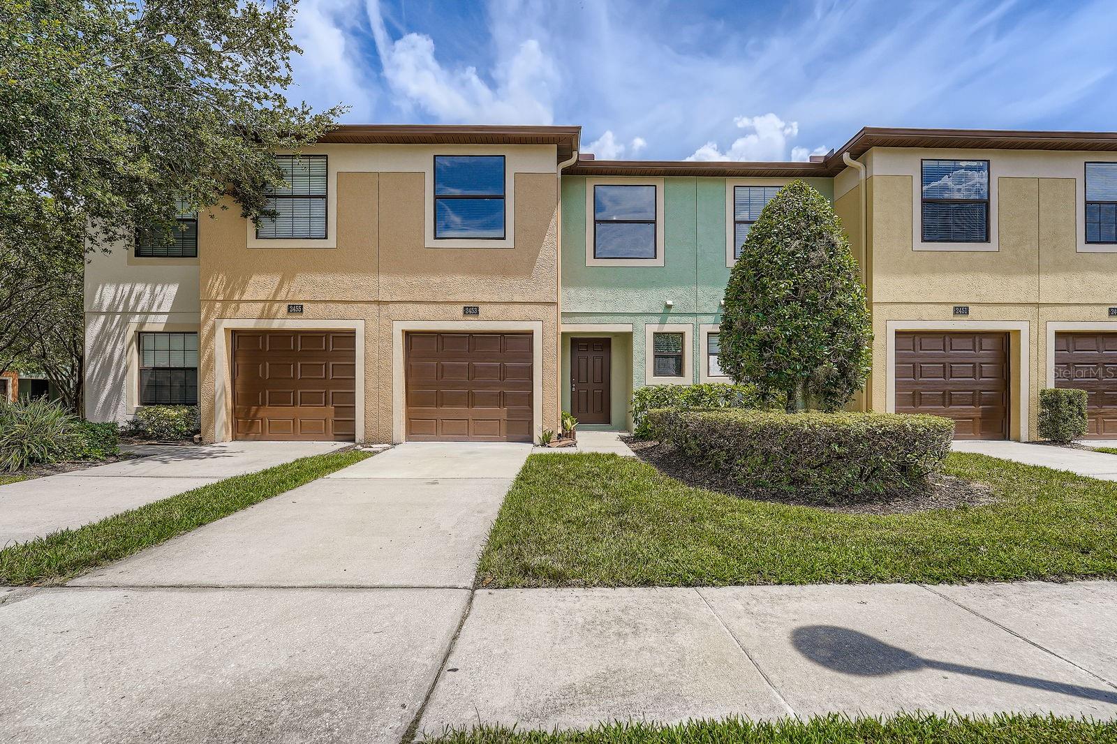 Welcome home to this charming two-story townhome located in a gated community with access to a sparkling pool. This 3-bedroom, 2.5-bathroom residence is ideal for those seeking low-maintenance living with modern amenities. The main level features an open-concept layout, seamlessly connecting the kitchen, dining area, and living room—perfect for entertaining or everyday living. A convenient half bath is tucked away on the main floor for guests. Step outside to your covered patio and enjoy relaxing or hosting gatherings. Upstairs, you'll find all three bedrooms, including an owner’s suite with a private en-suite bathroom and walk-in closet. Two additional bedrooms share a full bath, and the upstairs laundry area adds extra convenience. 1-car garage for covered parking or storage. Easy access to I-75, commuting and travel are a breeze. Don't miss your opportunity to live in this well-maintained, amenity-rich community. Schedule your showing today!