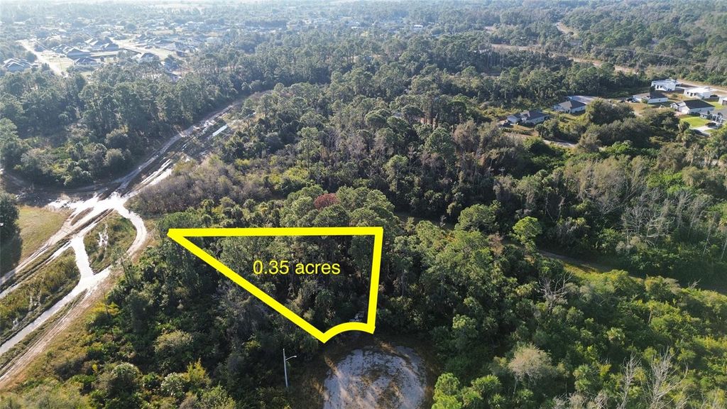 Photo of 616 Lombardy Court, Lehigh Acres, FL 33972 (MLS # O6393745)