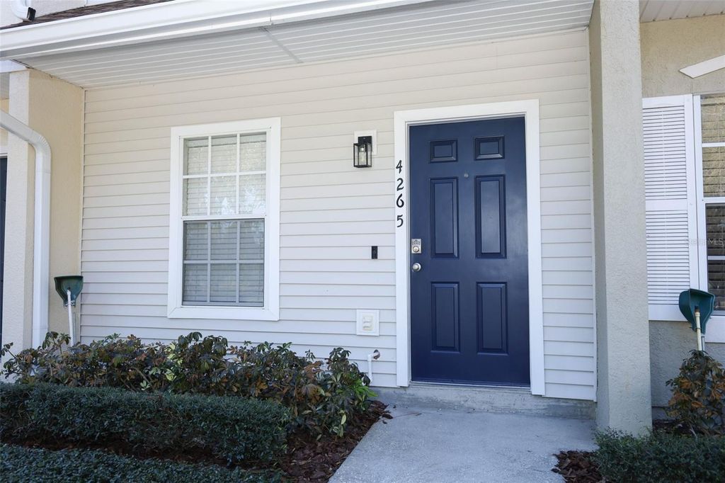Photo of 4265 Plantation Cove Drive, Orlando, FL 32810 (MLS # O6379103)