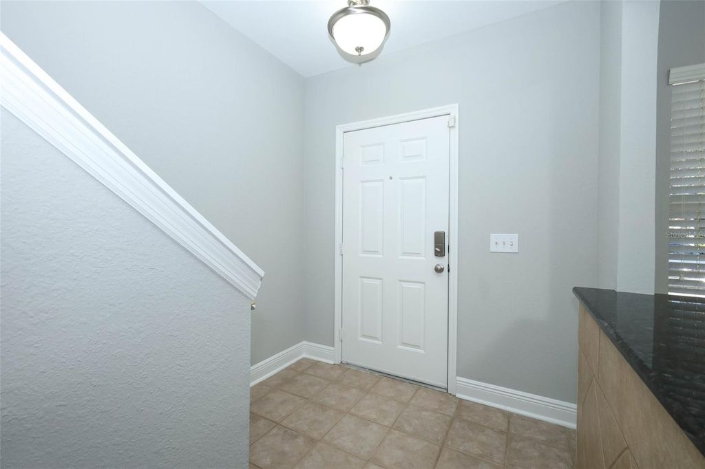 Photo of 4265 Plantation Cove Drive, Orlando, FL 32810 (MLS # O6379103)