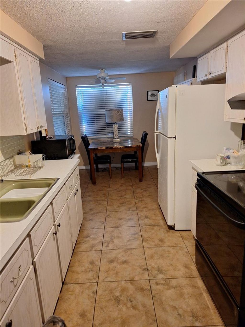 Photo of 1550 Roundtree Road, Holiday, FL 34690 (MLS # TB8463019)