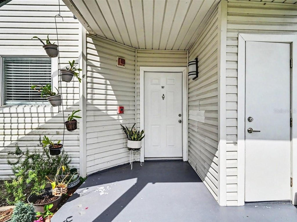 Photo of 2552 Woodgate Boulevard #107, Orlando, FL 32822 (MLS # O6416786)