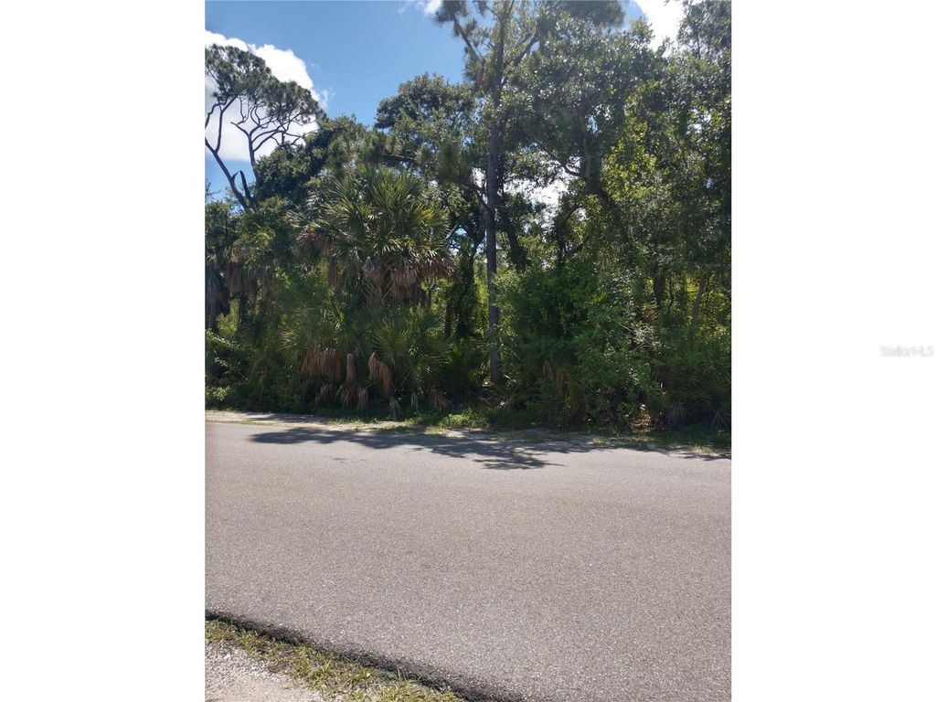 Photo of 1404 Kenesaw Street, Port Charlotte, FL 33948 (MLS # O6220009)