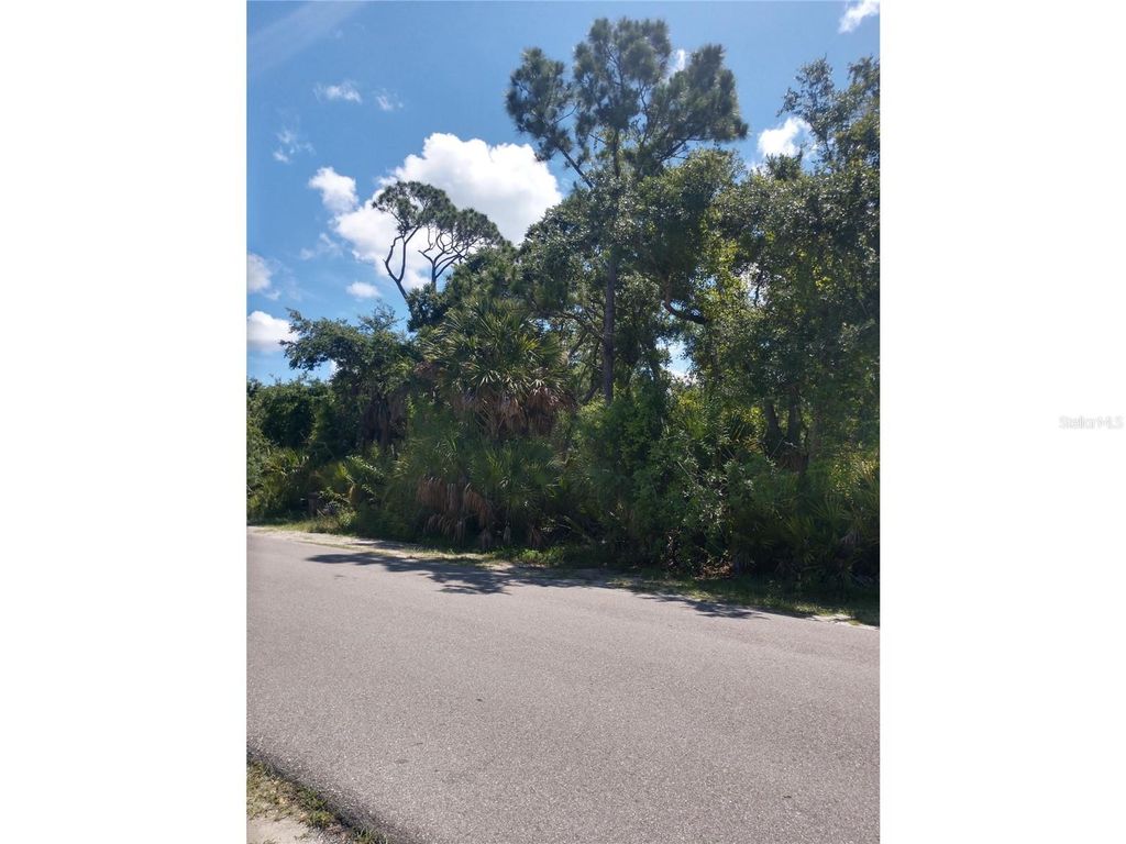 Photo of 1404 Kenesaw Street, Port Charlotte, FL 33948 (MLS # O6220009)