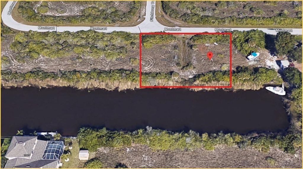 Photo of 14315 Montmarte Avenue, Port Charlotte, FL 33981 (MLS # D6139347)