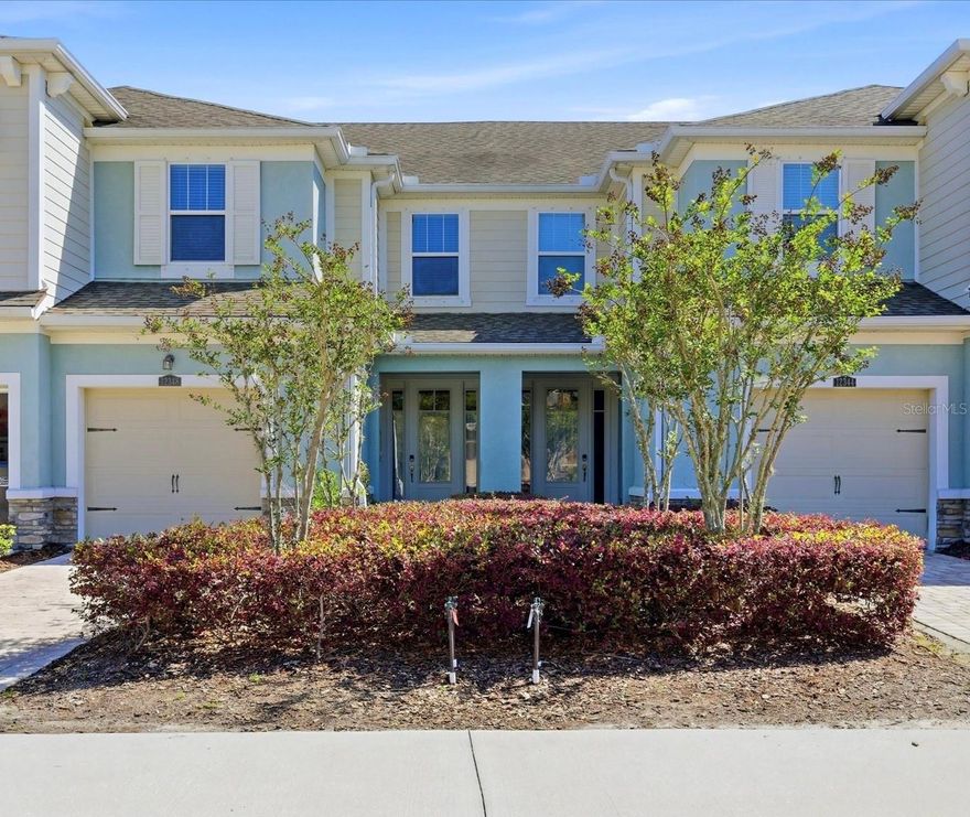 Beautifully updated 3-bedroom, 2.5-bath townhome in the highly desirable neighborhood of Harmony at Lakewood Ranch. This light-filled home features stylish ceramic tile flooring and tranquil water views from the screened, pavered lanai—creating the perfect setting to relax and unwind.  Step inside to a welcoming, spacious entry with a convenient drop zone, ideal for packages, shoes, and everyday essentials. The thoughtfully designed floor plan offers an open main living area perfect for both comfortable daily living and entertaining, while the spacious bedrooms upstairs provide a quiet respite. Enter the Primary Suite through elegant French Doors from the landing at the rear of the stairs; wide windows give you a full view of the water . The kitchen is a standout for those who love to cook, featuring quartz countertops, abundant cabinetry, and a large island perfect for meal prep, gathering, or casual dining.  Enjoy easy, low-maintenance living in a beautifully maintained community just minutes from shopping, dining, parks, and top-rated schools. Whether you're looking for a full-time residence or a seasonal getaway, this home offers the best of the vibrant Lakewood Ranch lifestyle.