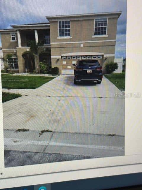 Photo of Kissimmee, FL 34758 (MLS # TB8539846)