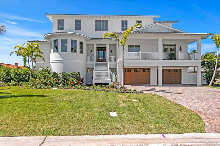 Welcome HOME to Bayway Isles – a coveted and premier waterfront community in St. Petersburg! Featuring another rare opportunity to buy luxury NEW construction from one of St. Petersburg’s custom home builders, Coastline Development! Showcasing a coastal simplistic design, this home is welcoming yet elegant in style. Spanning nearly 4600 SFT, the home will feature 4 bedrooms, 3 full baths, 2 powder (half) baths, dining room, office, bonus (flex) space, 3 car finished garage, wood & gas burning fireplace, 3-stop elevator, front and rear porches, custom pebble tec pool & spa, and so much more! The ground level features a spacious 3 car garage, mud room, and a breezeway connecting two additional storage areas - which could be perfect for a future yoga studio or simply overflow storage. Upon entering, you will have a stunning open concept connecting the living, dining, and kitchen spaces. The living room is divine with its volume ceilings that showcase a custom coffered design. The cozy fireplace, with a sleek plaster finish, adds warmth during the cool winter months and charm to the overall space. The gourmet kitchen is the heart of the home and will feature custom wood cabinetry, leathered Michelangelo countertops, Thermador Fridge and wine cooler, Bosch dishwasher, Ilve range, and beautiful double kitchen islands. Also located on the 2nd level is a powder bathroom, spacious laundry room, and the office space which features a white oak wood beam ceiling detail and a beautiful water view. In fact, multiple rooms throughout this coastal home offer magnificent water views. Second level primary retreat as well which offers another beautiful coffered ceiling design with wallpaper detail, two private balconies, and a luxurious bathroom with walk in closet systems, his & her vanities, free standing clawfoot tub, and a walk-in glass shower enclosure. As you move upstairs to the 3rd level, this floor will offer 3 more bedrooms, one of which has an en-suite bathroom, and the other is a jack and jill arrangement. The expansive bonus room and lovely 2nd powder bath is also located on this floor. This bonus space is the perfect relaxing or entertaining area offering again beautiful views of the water including the Sunshine Skyway and Indian Key Nature Preserve. Exterior design elements to include but not limited to solid block construction, metal roof, Hardie Boys custom rafter tails, Kolbe impact rated windows with wood clad interior frames, custom metal gates, luscious landscaping, block privacy wall,  old Carolina savannah gray brick papered driveway, coral stone deck material, IPE stairways, and Canyon Ridge garage doors. Interior design elements will showcase beautiful luxury engineered wood flooring, custom wood ceiling treatments, high level millwork on windows & doors, level 5 smooth texture, Icynene spray foam insulation, 24 SEER Carrier GreenSpeed HVAC Systems, decorative light fixtures throughout, and so much more! Conveniently located to award winning Gulf Beaches and minutes to vibrant Downtown St. Petersburg featuring shops, dining, museums, St. Pete Pier, and so much more. Easy access to I-275 and Tampa International Airport. Residents also enjoy the Bayway Market which is a short stroll or bike ride ideal for grabbing produce, artisanal goods, fresh cut meat or seafood, or daily essentials. Schedule your personal tour today for this remarkable home!