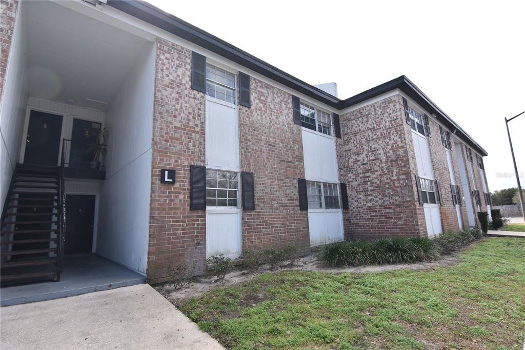 Photo of 5317 Curry Ford Road #L106, Orlando, FL 32812 (MLS # O6384032)