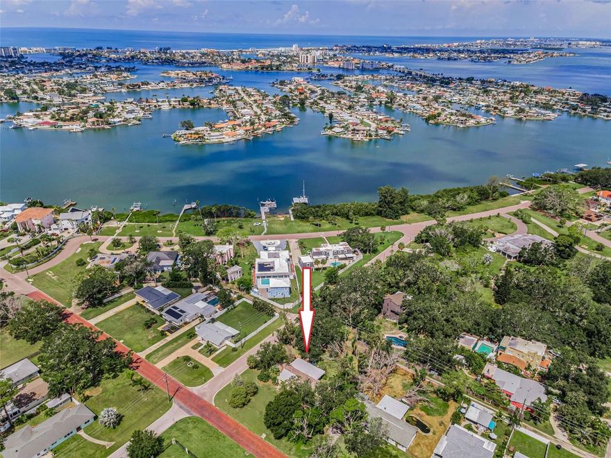 Highly desirable area of Old Pasadena. BUILDERS TAKE NOTICE. Rare opportunity to subdivide and build two homes side by side. Total parcel over one third acre. Each lot would be 57 X 150 with alley access for $312,500 each. Existing structure on property needs to come down as it sustained water damage from Hurricane Helene. See ML#TB8420066. This is an overall fabulous location. Brick lined streets compliment the charm of Old Pasadena. Beautiful towering oaks and million dollar homes throughout. Close to the beaches, I-275, vibrant downtown St. Pete, Gulfport district, shopping, restaurants, parks and more. Both lots need to be sold together will not sell separately.