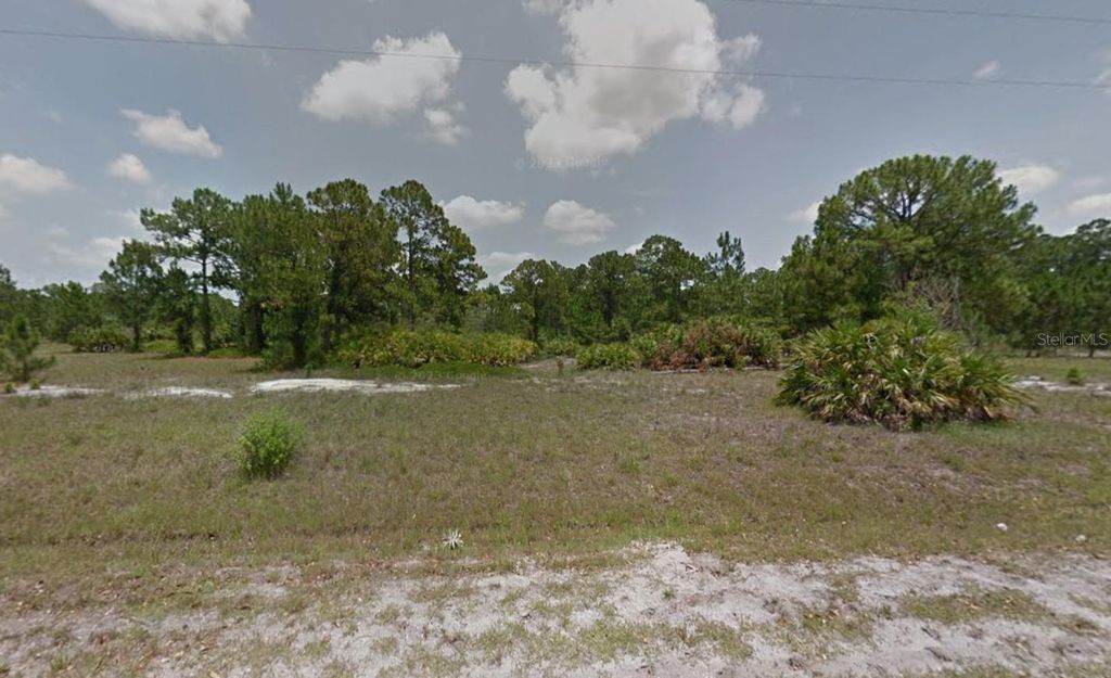 Photo of 225 N Kennel Street, Clewiston, FL 33440 (MLS # OK225659)