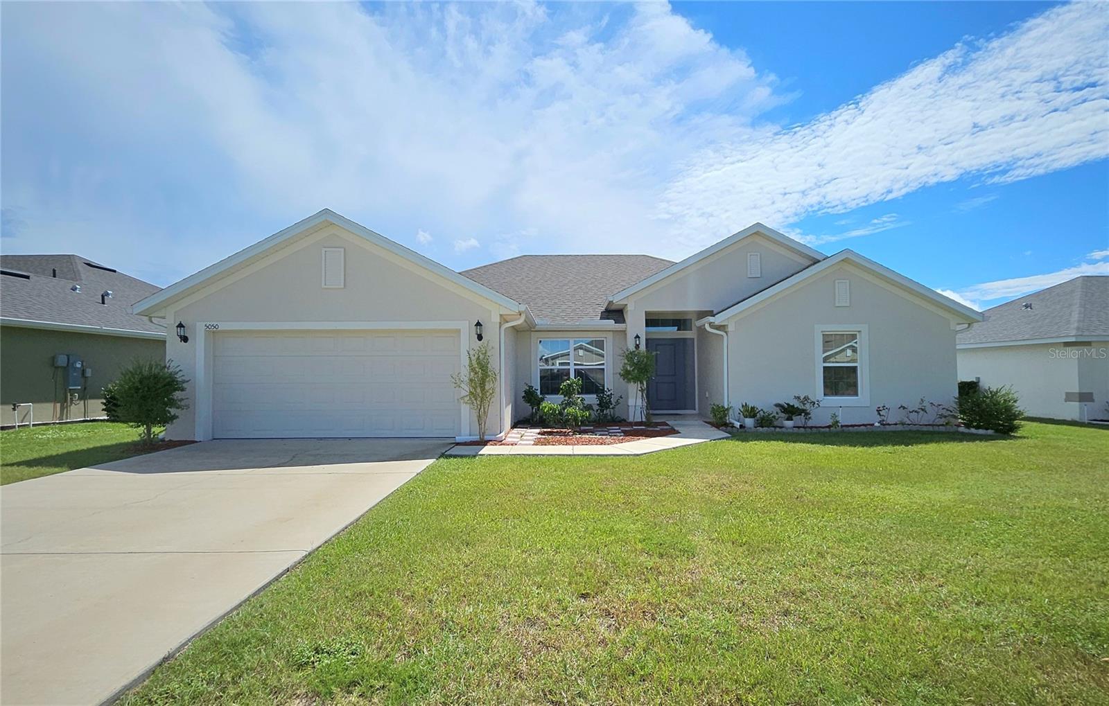 You will fall in love with this stunning 4 Bedroom, 3 Bath Home on a HUGE lot. Nestled in a coveted, no flood zone location and highly desirable school district, this hidden gem is looking for a new family. Outstanding open floorplan with luxury vinyl flooring throughout. Walk through the front door and see the beautiful kitchen and living area with vaulted ceilings and a separate dining area. Kitchen with ample cabinets and storage space, granite countertops, pantry, and 5 person eat-in kitchen. All 4 Bedrooms are spacious with plenty of closet space. Two bedrooms share a large, tastefully remodeled bathroom. The large Primary Bedroom with en-suite bathroom boasts a walk-in closet, garden tub, dual sink vanity, and tiled walk-in shower. There is also an additional guest bathroom which features a tub and shower combo. Dedicated laundry room with shelving and 2 car garage with driveway for plenty of parking space! Step outside into the HUGE backyard, perfect for entertaining guests on the open patio. Schedule your showing today!