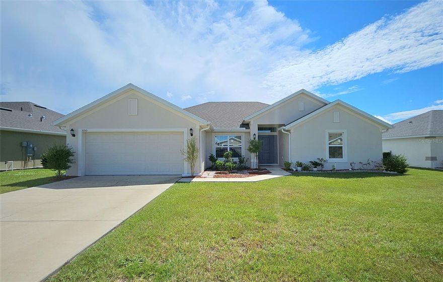 You will fall in love with this stunning 4 Bedroom, 3 Bath Home on a HUGE lot. Nestled in a coveted, no flood zone location and highly desirable school district, this hidden gem is looking for a new family. Outstanding open floorplan with luxury vinyl flooring throughout. Walk through the front door and see the beautiful kitchen and living area with vaulted ceilings and a separate dining area. Kitchen with ample cabinets and storage space, granite countertops, pantry, and 5 person eat-in kitchen. All 4 Bedrooms are spacious with plenty of closet space. Two bedrooms share a large, tastefully remodeled bathroom. The large Primary Bedroom with en-suite bathroom boasts a walk-in closet, garden tub, dual sink vanity, and tiled walk-in shower.  There is also an additional guest bathroom which features a tub and shower combo. Dedicated laundry room with shelving and 2 car garage with driveway for plenty of parking space! Step outside into the HUGE backyard, perfect for entertaining guests on the open patio. Schedule your showing today!