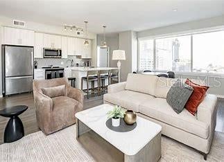 Photo of 119 E Pine Street, Orlando, FL 32801 (MLS # O6441511)
