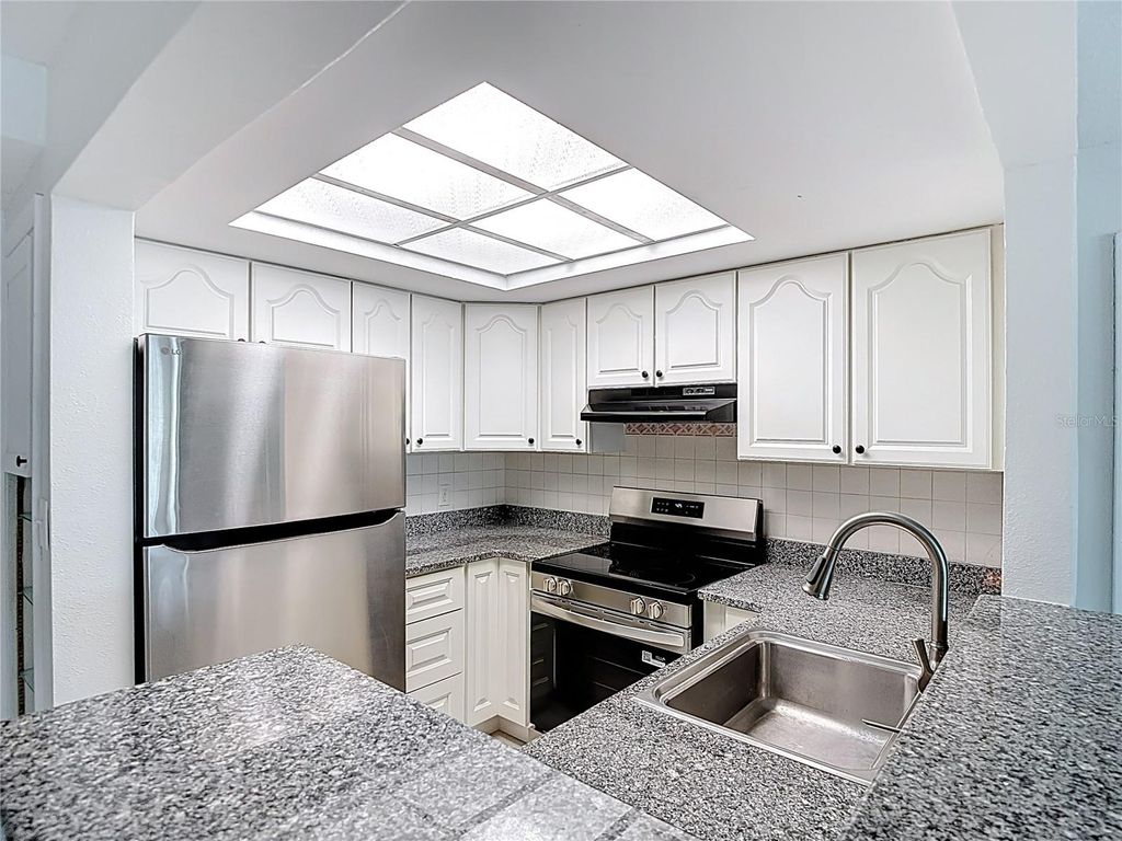 Photo of 5111 Amulet Drive #105, New Port Richey, FL 34652 (MLS # W7884544)