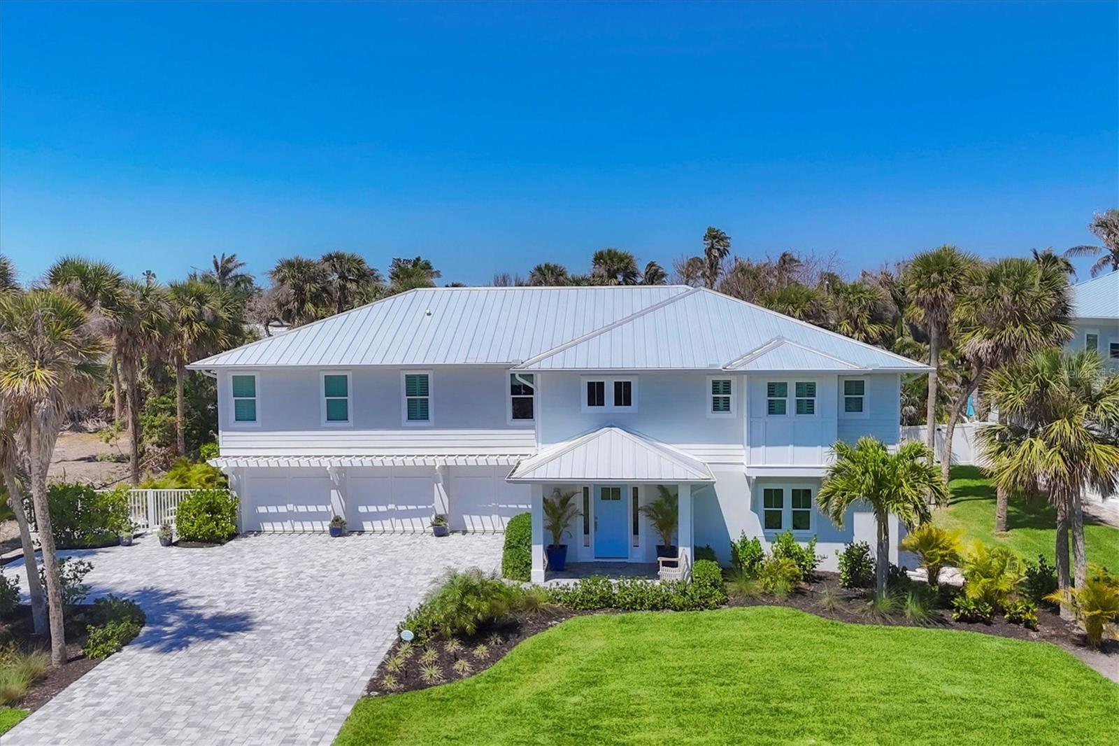 Weekly rate shown, please see description for detailed pricing.
Welcome to your private, island sanctuary on the serene South End of Boca Grande. This elegant 3-bedroom, 3.5-bath retreat blends coastal sophistication with modern luxury, creating the perfect escape for up to six guests.
The primary suite offers a lavish king bed, spa-like en suite bath, and tranquil views that set the stage for ultimate relaxation. A beautifully appointed queen bedroom provides quiet charm, while the third guest room with two full-size beds is ideal for additional guests or family. A dedicated office with its own private bath ensures comfort for those balancing work with leisure.
The heart of the home is its open-concept living area, filled with natural light and designed for both comfort and style. A gourmet kitchen with premium appliances and sleek finishes inspires culinary creativity, while the dining space and living room invite memorable gatherings.
Outdoors, a private heated pool shimmers beneath the Florida sun, framed by lush landscaping for complete privacy. Lounge in the lanai gazebo, enjoy cocktails by the pool deck, or savor al fresco dining as the evening sky glows with Boca Grande’s famous sunsets.
Beyond the home, Boca Grande offers timeless charm — stroll along powder-soft beaches, bike beneath the iconic banyan trees, or explore boutique shops, art galleries, and world-class dining just minutes away. For the adventurous, fishing, boating, golfing, and paddleboarding provide endless opportunities to experience the natural beauty of the island.
The Grande Getaway is more than a vacation home — it’s a luxurious retreat where modern comfort meets the island’s tranquil elegance, designed for unforgettable memories in one of Florida’s most enchanting destinations. Off-season: $5250 weekly/$22500 monthly
Mid-season: $6000 weekly/$25700 monthly In-season: $7250 weekly/$31000 monthly