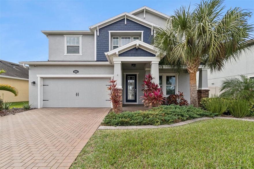 Welcome to Long Lake Ranch, Tampa Bay’s award-winning community in Lutz, where lakefront living, outdoor recreation, and everyday convenience come together. This two-story Craftsman-style home on Long Lake, featuring a first-floor office/den, may be rented furnished at an additional cost, offering flexibility to suit your lifestyle. The home delivers a relaxed yet refined living experience, with peaceful water views, scenic walking trails, and thoughtfully designed spaces made for both gathering and unwinding. Designed around an open great room and gourmet kitchen, the home invites easy entertaining and comfortable daily living. Enjoy cooking and hosting in a beautifully upgraded kitchen featuring stainless steel appliances with a double wall oven, granite countertops, Espresso-finish cabinetry with crown molding, a spacious island, and a walk-in pantry, flowing seamlessly into the formal dining room. Sliding doors lead to an extended screened-in lanai, where mornings begin with lake views and evenings are spent enjoying Florida’s outdoor lifestyle in a private, fenced backyard. Upstairs living is equally inviting, highlighted by a spacious owner’s suite with tray ceiling, spa-inspired bath, soaking tub, frameless shower, and dual vanities, creating a private retreat at the end of the day. A large loft provides flexible space for a media room, home office, or play area, while a private en-suite bedroom and additional secondary bedrooms offer comfort and versatility. Beyond the home, Long Lake Ranch delivers a true resort-style experience. Residents enjoy a pool with splash zone, tennis and basketball courts, playgrounds, dog park, picnic areas, and access to a 42-acre natural lake ideal for walking, kayaking, and fishing, all surrounded by lush conservation and wetlands. Conveniently located near shopping, dining, golf, and beaches, with easy access to SR-54, Suncoast Parkway, US-41, I-75, and Tampa International Airport, this home offers a lakefront lifestyle in one of Lutz’s most sought-after communities.