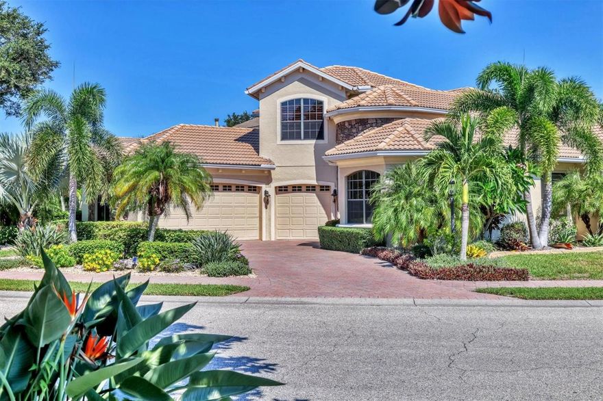 Located in the heart of Sarasota, this beautifully crafted Lee Wetherington–built residence is set within a friendly gated neighborhood of just 99 homes, complete with charming gas streetlights. Enjoy the convenience of being close to shopping, dining, golf courses, UTC Mall, and just a short drive to world-famous Siesta Key Beach.

This versatile five-bedroom floor plan offers the primary suite and two additional bedrooms or office and exercise room on the main level, with two more bedrooms and a full updated bath upstairs.

The gourmet kitchen showcases granite countertops, tall cabinets with crown molding, natural gas cooktop, updated stainless steel appliances, a large pantry, and under-cabinet LED lighting. Additional living spaces include a formal living and dining room with built-in buffet and wine rack, a comfortable family room with wet bar and wine refrigerator, and unique corner sliders that open fully to the lanai.

Step outside to a paver deck with natural gas heated saltwater pool and spa, with the option of solar panels for efficiency, and serene water views. Enjoy the large covered seating area on the lanai for entertaining and TV watching.  An oversized three-car garage with electric car plug, abundant closet space, and custom master closet with wood shelving enhance the home’s functionality.

Recent updates include: whole-house water filtration with under-sink H2 unit, new natural gas hot water heater with stand and thermal jacket, new faucets, microwave/convection oven (2023), concrete flower bed edging, and a complete landscape refresh.

This is a stunning home inside and out, offering exceptional craftsmanship, thoughtful upgrades, and an ideal Sarasota location.