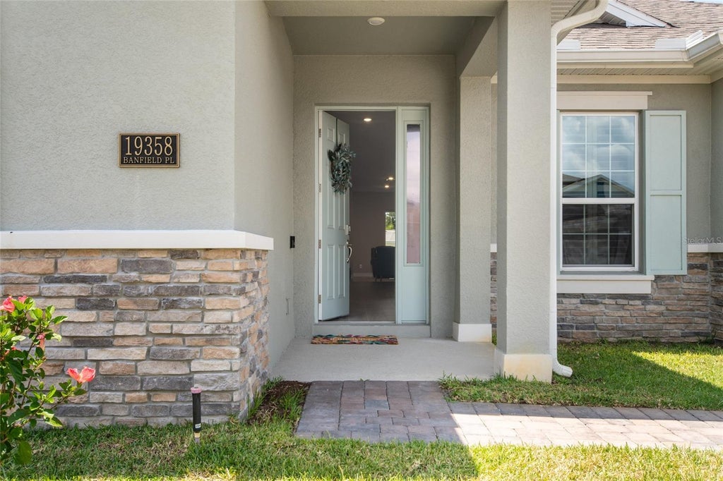 Photo of 19358 Banfield Place, Orlando, FL 32827 (MLS # O6419063)