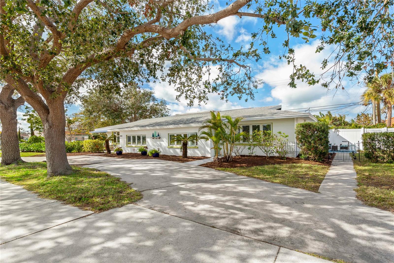 DRAMATIC PRICE ADJUSTMENT: Paradise Found. Unique "Golden Beach" Turn-Key Furnished Mid-Century Modern Style Saltwater Pool Home With 800 Sq. Ft. Private Guest Quarters, Multi-Generational Apartment Or High Demand Year-Round Income Producing Rental With Complete Kitchen And Private Entrance Is But Steps Away From The Deeded "Golden Beach" Entry With Gulf Of Mexico Access And Comes With 2 Parking Permits - If You Should Choose To Drive. This Venice Island Home Has Been Pristinely Renovated With Elegant Designer Finishes And Unique Architectural Interest That Will Capture Your Imagination Wherever Your Eyes Turn. New Roof Was Installed in 2018 And The Major Systems, Including The A.C., Hot Water Heater And Appliances Are Between 5-6 Years Of Age. The Streaming Natural Light Will Only Highlight The Beautiful 3 Bedroom Main Residence Layout With One Bedroom With Sitting Room Or Office On The First Floor And Two Bedrooms With Full Bath On The Second Floor Has More Than Ample Storage And Closets Throughout. The Home Is Designed With Custom Wood And Stainless Steel Kitchen Cabinetry With A Nod To Commercial Kitchen Styling And Functionality With A Poured Concrete Breakfast Bar And An Oversized Unique Climate Controlled Walk-In Pantry That Should Be Sure To Please The Ambitious Or Adventurous "Chef". The Separate Dining Room Will Encourage Intimate Family Dinners Or Has Ample Space For The Extravagant Get Together One May Like To Invite Their Friends To. Family Or Friends Staying Over? The Private Entry Fully Terrazzo-Floored 40' x 20'/800 Sq. Ft. 1 Bedroom, 1 Bath With Kitchen And Living Room Can Accomodate A Short Visit, An Extended Stay Or A Zoning Compatible Income Producing Rental While Insuring Your Privacy In The Main Residence. You Will Find Yourself Daily Drawn To The Outdoors To Explore The Beautiful Nearby Public Beaches, Parks, Fishing Pier On Venice Beach, Venice Marina, The Public Tennis Courts, The Excellent Restaurants And Theater Venues Located On The Isles Or Possibly Decide To Join The "Freedom Boat Club" Or Try Your "Swing" At The Areas' Myriad Of Available Golf Courses Or Simply Relax On The Over-Sized Lanai Deck In Your Saltwater Pool. There Is Even A Dog Beach To Bring Your Dog To Or Just Have Fun Watching The Other Dogs Romp And Play At The Brohard Paw Park Which Is Under Two Miles Away. Venice Isles Is A Community That Is "Small" Enough To Be Special Yet "Large" Enough To Offer You The Amenities And Lifestyle You Have Been Seeking-Without Any Compromise. Please Take A Moment To View The Accompanying Video Tour Labelled "Virtual Tour" Or Click On The Accompanying Link:
https://tinyurl.com/yc8jrae4
