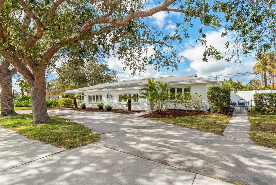 DRAMATIC PRICE ADJUSTMENT:  Paradise Found.  Unique "Golden Beach" Turn-Key Furnished Mid-Century Modern Style Saltwater Pool Home With 800 Sq. Ft. Private Guest Quarters, Multi-Generational Apartment Or High Demand Year-Round Income Producing Rental With Complete Kitchen And Private Entrance Is But Steps Away From The Deeded "Golden Beach" Entry With Gulf Of Mexico Access And Comes With 2 Parking Permits - If You Should Choose To Drive.  This Venice Island Home Has Been Pristinely Renovated With Elegant Designer Finishes And Unique Architectural Interest That Will Capture Your Imagination Wherever Your Eyes Turn.  New Roof Was Installed in 2018 And The Major Systems, Including The A.C., Hot Water Heater And Appliances Are Between 5-6 Years Of Age.  The Streaming Natural Light Will Only Highlight The Beautiful 3 Bedroom Main Residence Layout With One Bedroom With Sitting Room Or Office On The First Floor And Two Bedrooms With Full Bath On The Second Floor Has More Than Ample Storage And Closets Throughout.  The Home Is Designed With Custom Wood And Stainless Steel Kitchen Cabinetry With A Nod To Commercial Kitchen Styling And Functionality With A Poured Concrete Breakfast Bar And An Oversized Unique Climate Controlled Walk-In Pantry That Should Be Sure To Please The Ambitious Or Adventurous "Chef".  The Separate Dining Room Will Encourage Intimate Family Dinners Or Has Ample Space For The Extravagant Get Together One May Like To Invite Their Friends To.  Family Or Friends Staying Over?  The Private Entry Fully Terrazzo-Floored 40' x 20'/800 Sq. Ft. 1 Bedroom, 1 Bath With Kitchen And Living Room Can Accomodate A Short Visit, An Extended Stay Or A Zoning Compatible Income Producing Rental While Insuring Your Privacy In The Main Residence.  You Will Find Yourself Daily Drawn To The Outdoors To Explore The Beautiful Nearby Public Beaches, Parks, Fishing Pier On Venice Beach, Venice Marina, The Public Tennis Courts, The Excellent Restaurants And Theater Venues Located On The Isles Or Possibly Decide To Join The "Freedom Boat Club" Or Try Your "Swing" At The Areas' Myriad Of Available Golf Courses Or Simply Relax On The Over-Sized Lanai Deck In Your Saltwater Pool. There Is Even A Dog Beach To Bring Your Dog To Or Just Have Fun Watching The Other Dogs Romp And Play At The Brohard Paw Park Which Is Under Two Miles Away.  Venice Isles Is A Community That Is "Small" Enough To Be Special Yet "Large" Enough To Offer You The Amenities And Lifestyle You Have Been Seeking-Without Any Compromise.  Please Take A Moment To View The Accompanying Video Tour Labelled "Virtual Tour" Or Click On The Accompanying Link:   
https://tinyurl.com/yc8jrae4