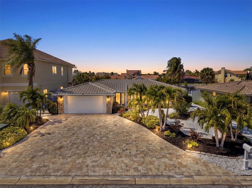 Discover an exceptional rare waterfront boating community of Gulf Harbors in New Port Richey. Where refined living meets effortless access to the open Gulf. Positioned on a deep-water canal with unobstructed passage to open waters, this residence offers a rare blend of sophistication, privacy, and true boating convenience. Inside, this beautifully newly remodeled 2-beddroom + a Den equpped with Beverage and wine refrigerators can be easily converted to a 3rd-bedroom. This home unfolds with a sense of understated elegance and thoughtfully designed for both entertaining and everyday comfort, this waterfront retreat features a flowing open layout from the front door to the pool & waterfall hot tub.  A chef’s kitchen anchors the living space, showcasing premium Monogram and Electrolux appliances with 10 year extended warranty. Interior enhancements include high-end soft-close cabinetry, plantation shutters, and an elegant electric fireplace. and elevated finishes designed for both culinary artistry and everyday comfort. The adjoining family room and graceful salon—complete with wine refrigeration and dual beverage drawers—create an inviting atmosphere for intimate gatherings or grand entertaining. The outdoor environment is a private tropical retreat. A new saltwater pool glimmers against travertine decking, while the fully equipped summer kitchen—with pizza oven—sets the stage for alfresco dining. Multiple seating areas, a spacious composite deck, 10,000-lb lift, and both stationary and floating docks provide an unparalleled waterfront experience for the avid boater. Thoughtfully upgraded for peace of mind and modern convenience, the home features a New $34K Flood Gate Pro-flood protection system, whole-house Generac generator, assumable Freedom Solar lease, Spring Well water filtration & softener, new paver drive and walkway, and a beautifully finished garage with epoxy flooring, cabinetry, and EV/RV outlet. Exclusive Private Beach Membership available for $200 a year. This is more than a home-it’s a lifestyle it.