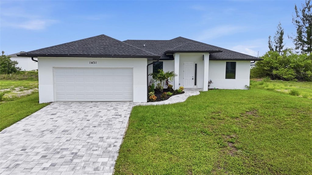 Photo of 1431 NW 17th Avenue, Cape Coral, FL 33993 (MLS # O6446927)