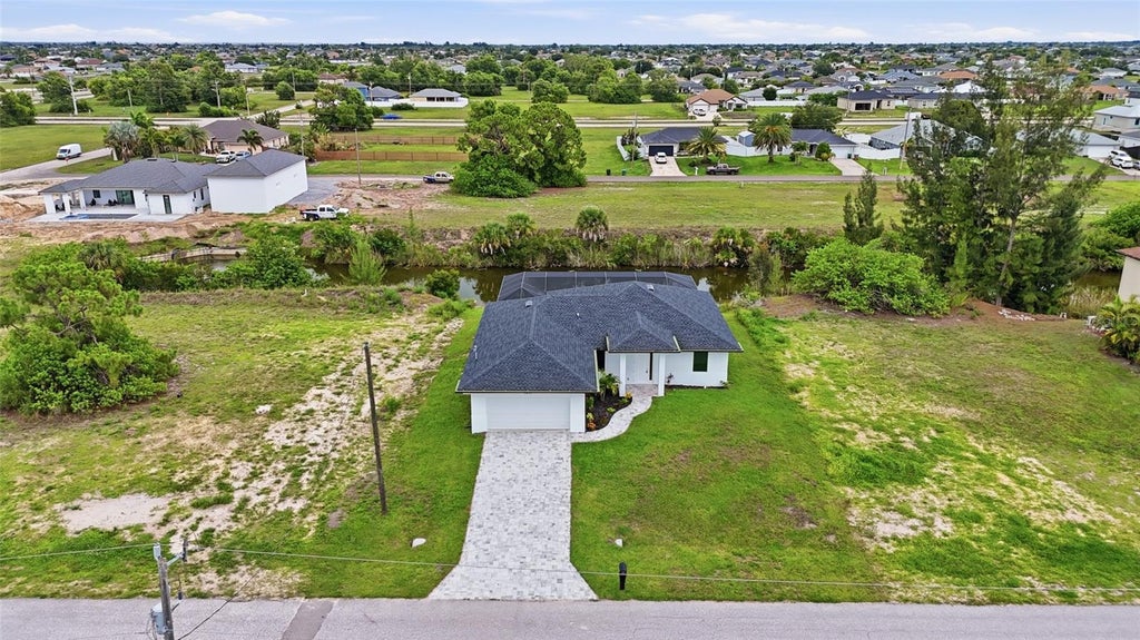 Photo of 1431 NW 17th Avenue, Cape Coral, FL 33993 (MLS # O6446927)