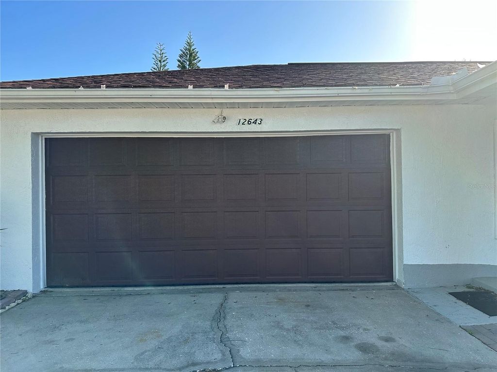 Photo of 12643 Idaho Woods Lane, Orlando, FL 32824 (MLS # O6396326)